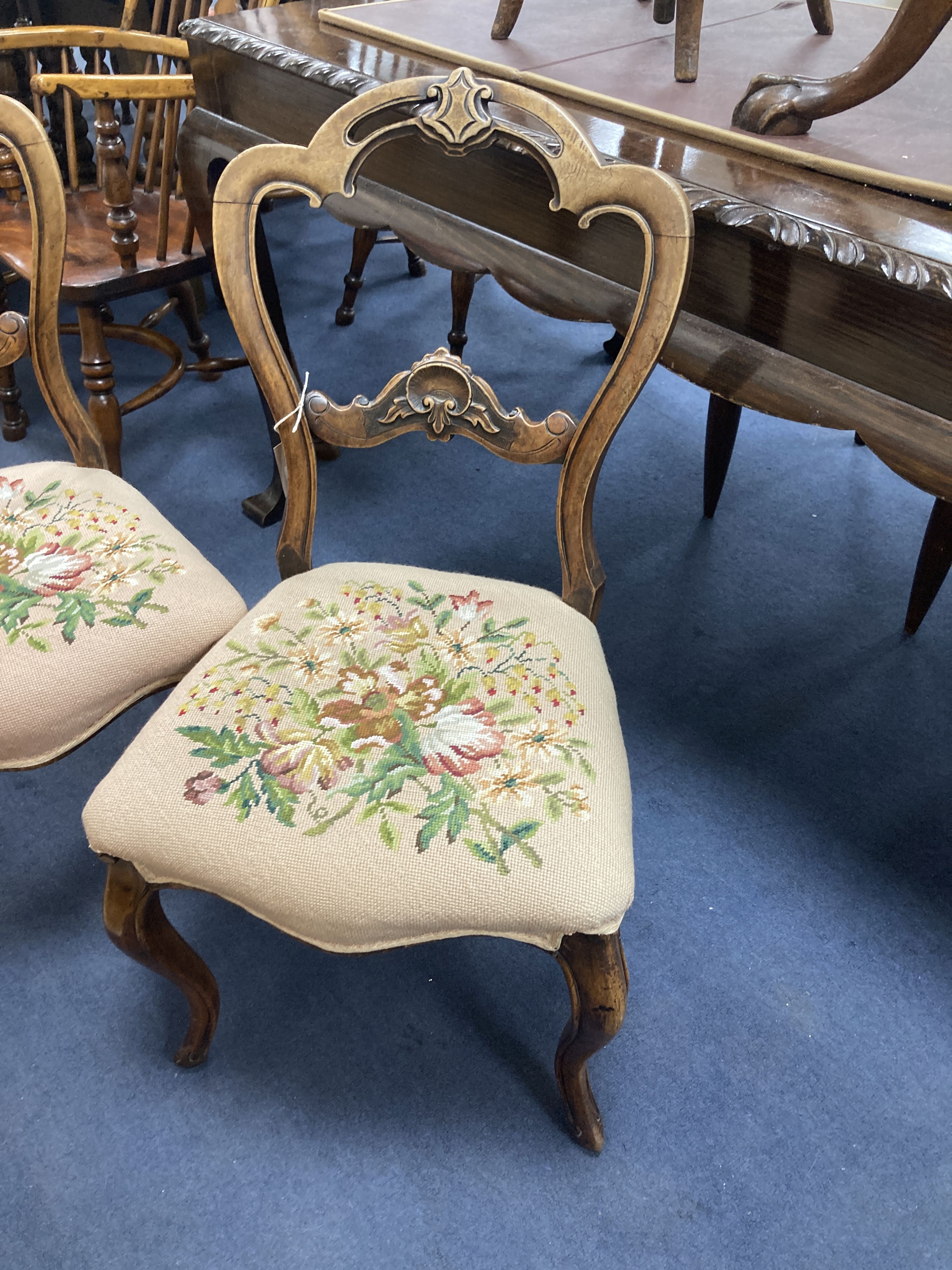 A pair of Victorian walnut side chairs